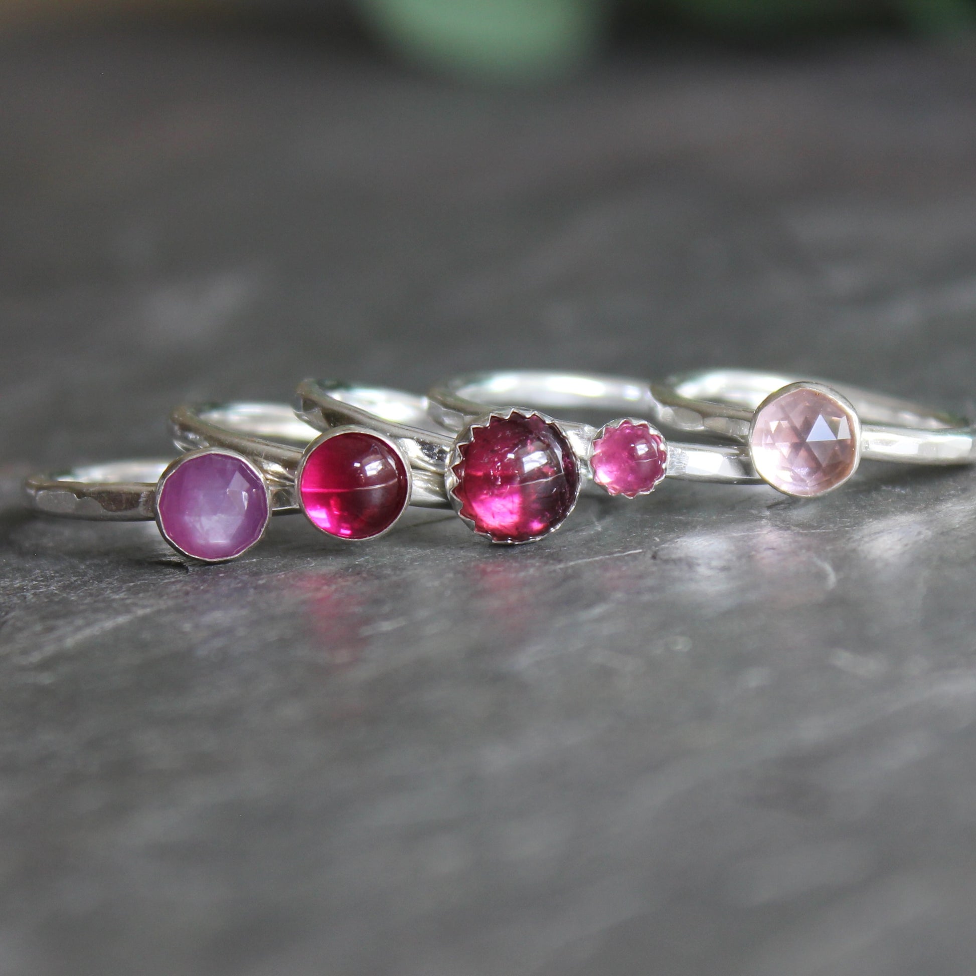 Stacking Rings Left to Right:  Pink Silk Sapphire, Lab Created Ruby x 2, Tiny Pink Tourmaline, Pale Pink Morganite