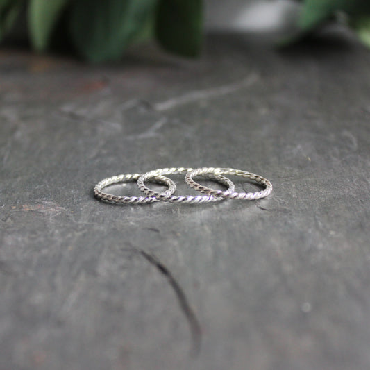 A set of three twisted wire sterling silver stacking rings.  Each sold separately. 