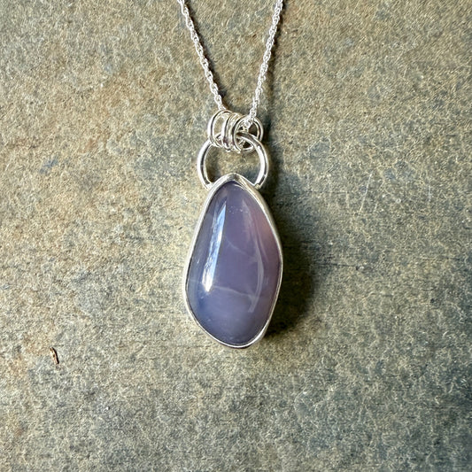 This is a genuine Oregon Holley Blue agate cabochon that is set in fine & sterling silver and comes with a sterling This is a genuine Oregon Holley Blue agate cabochon that is set in fine & sterling silver and comes with a sterling silver chain. Holly Blue agate is a rare gemstone that is found only in a small area of private timberland near Sweethome, OR.silver chain. Holly Blue agate is a rare gemstone that is found only in a small area of private timberland near Sweethome, OR.