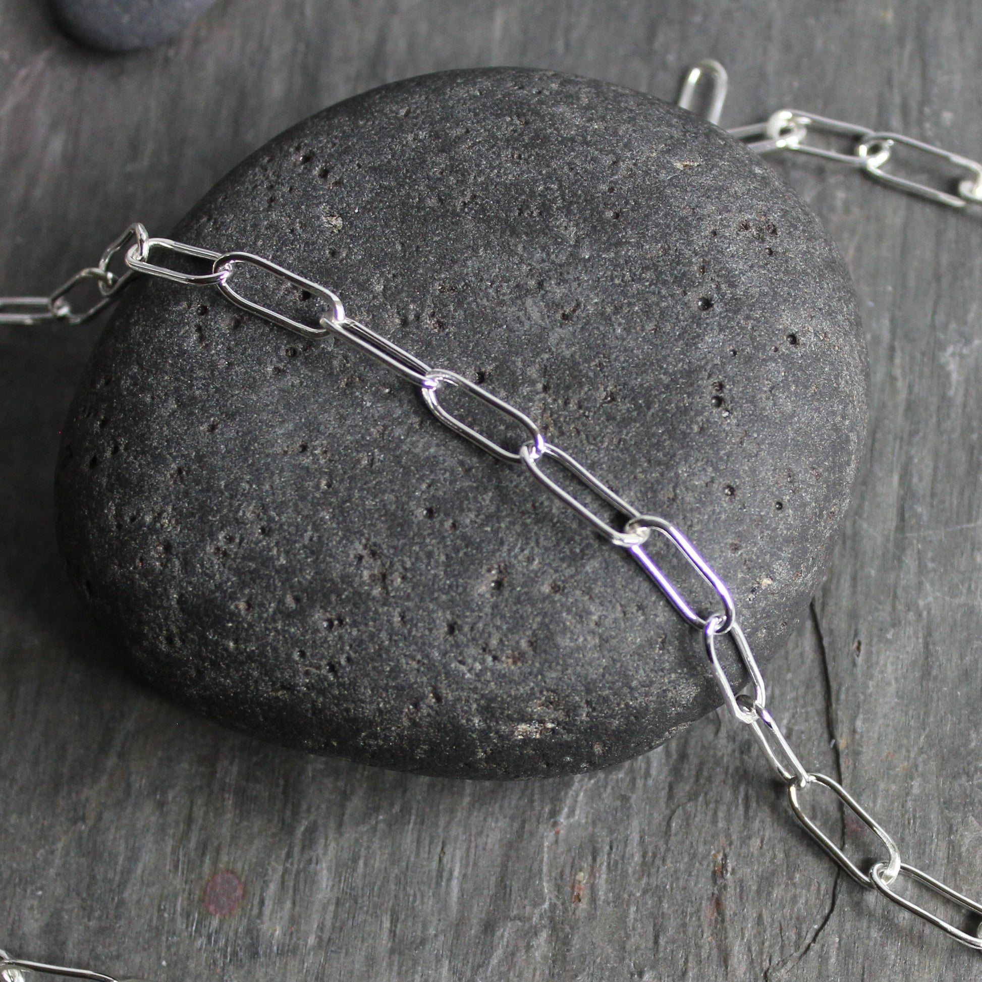 A sterling silver paperclip link chain handmade with 18 gauge sterling silver wire and finished with a lobster clasp. 