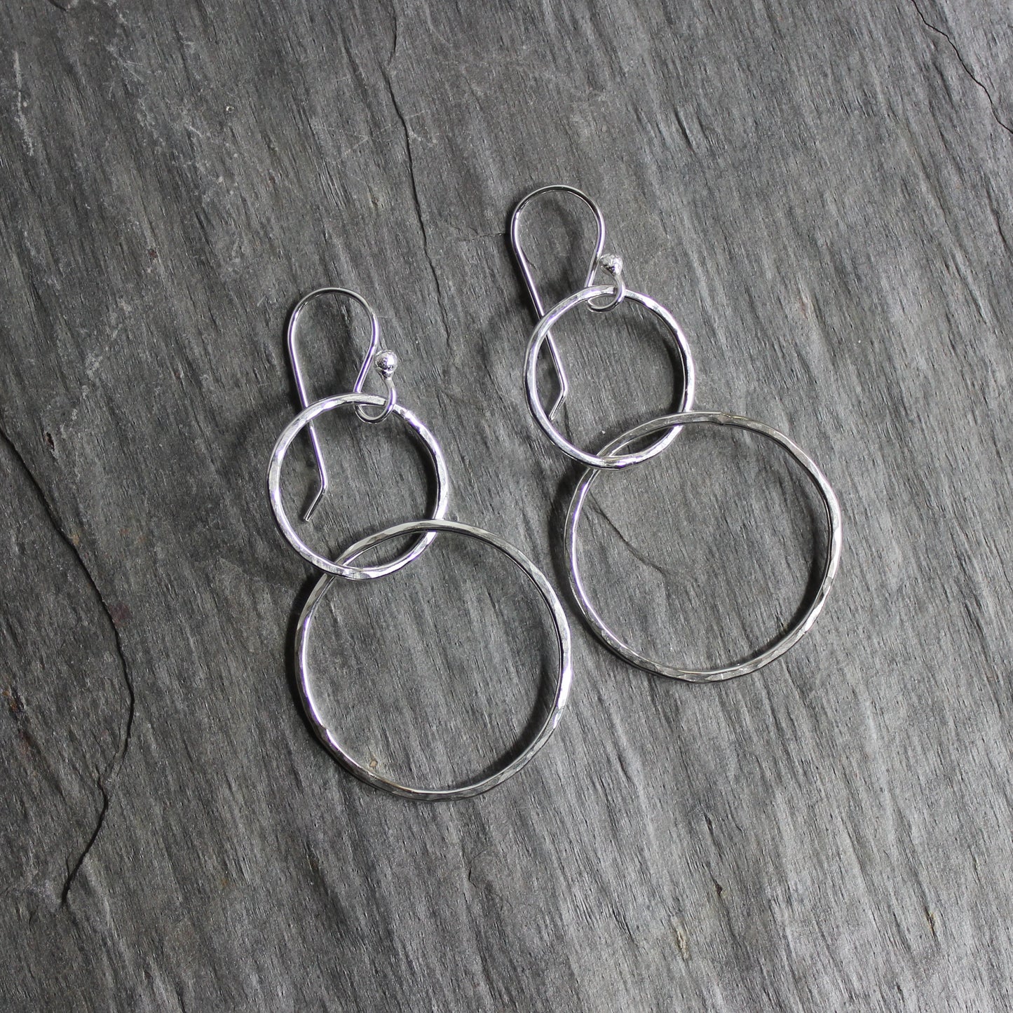 hammered silver double circle dangly earrings