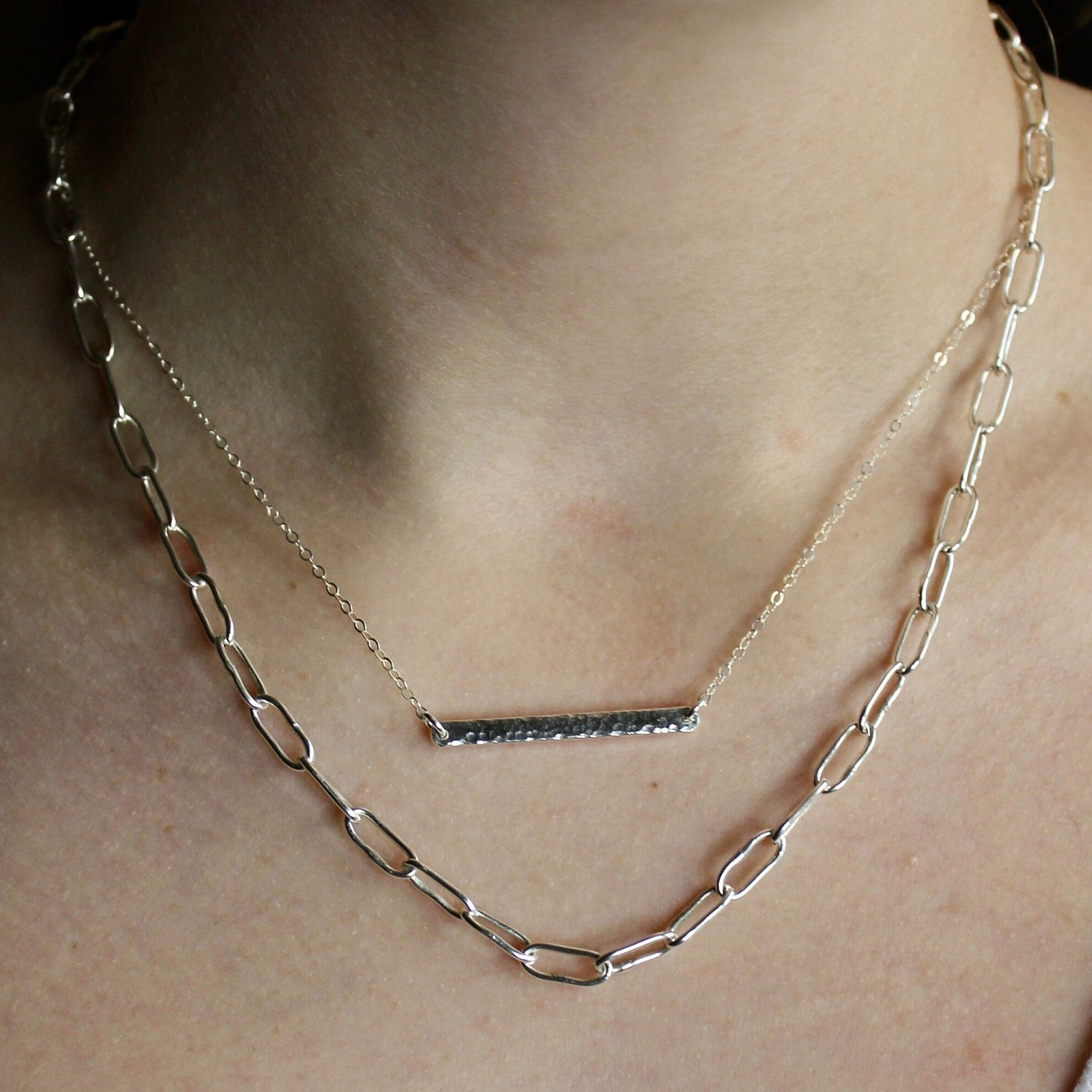 This is a handmade lightweight sterling silver chain with oval links that are approximately 10mm long.
