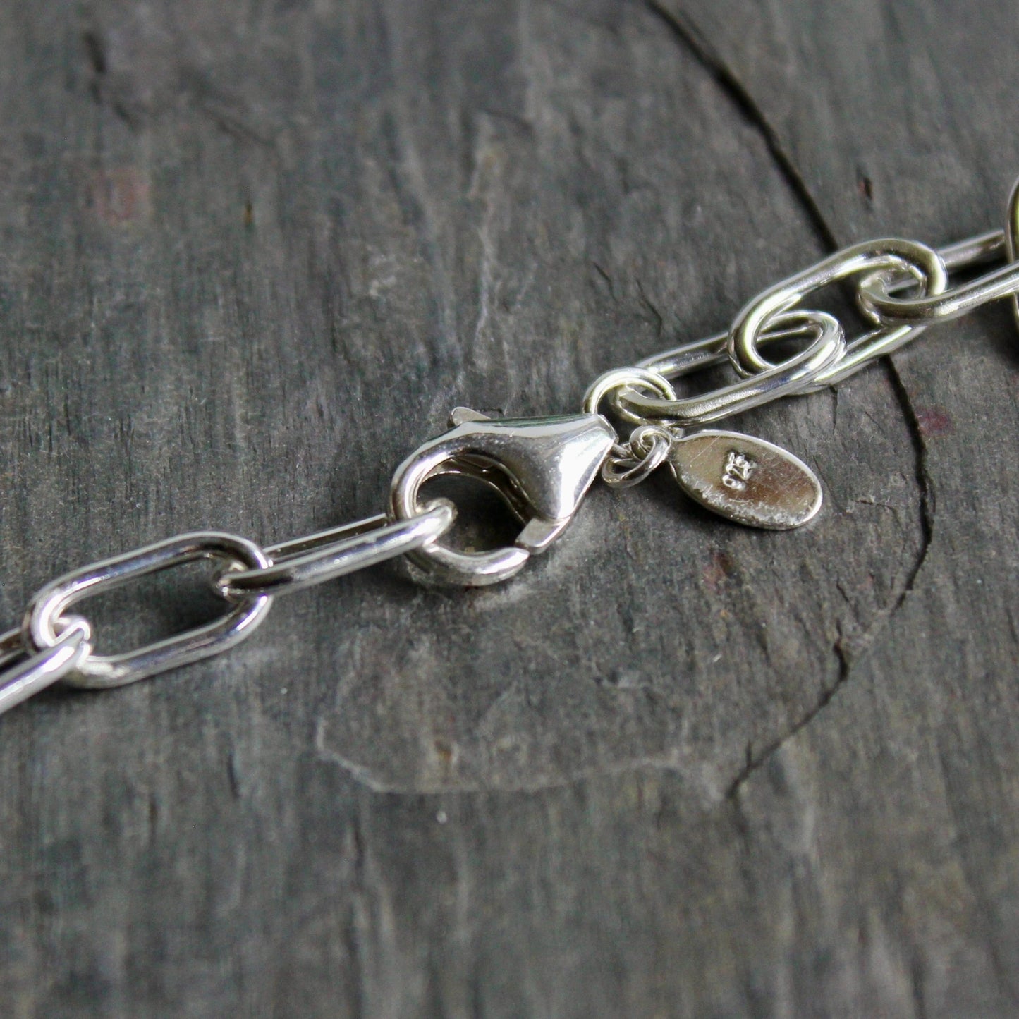 This necklace has medium weight oval sterling silver links that have been handcrafted by Will Macy in Corvallis, OR. 