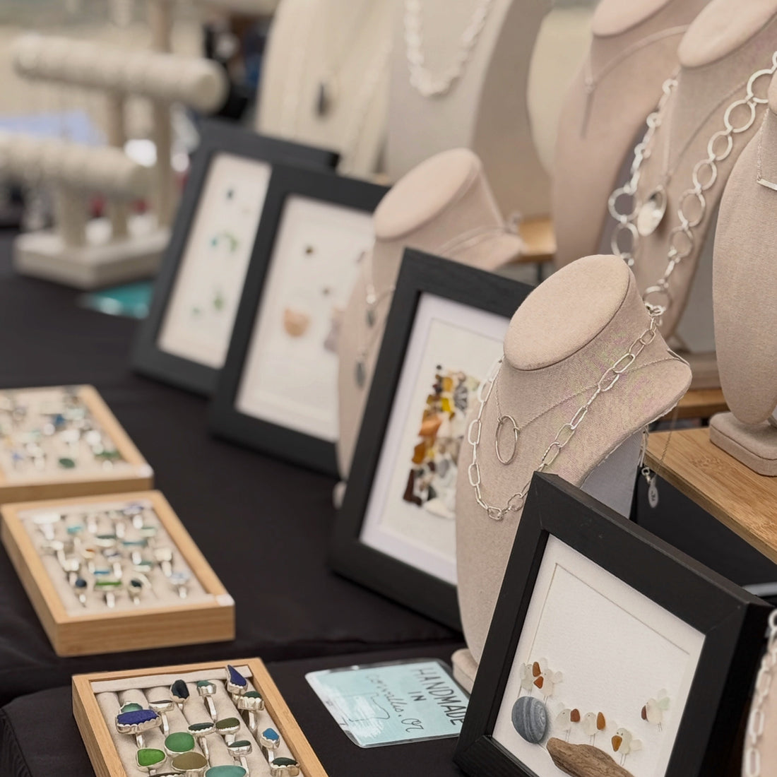 A photo of Accent Yourself handmade jewelry booth set up and ready for customers. 