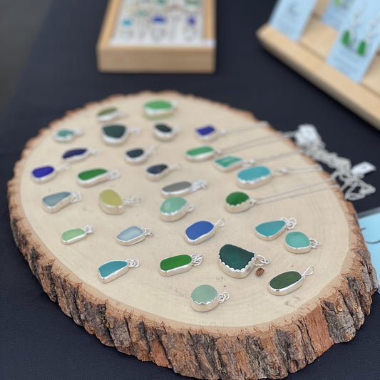 Handmade sea glass pendants by Accent Yourself, a small handmade jewelry business.