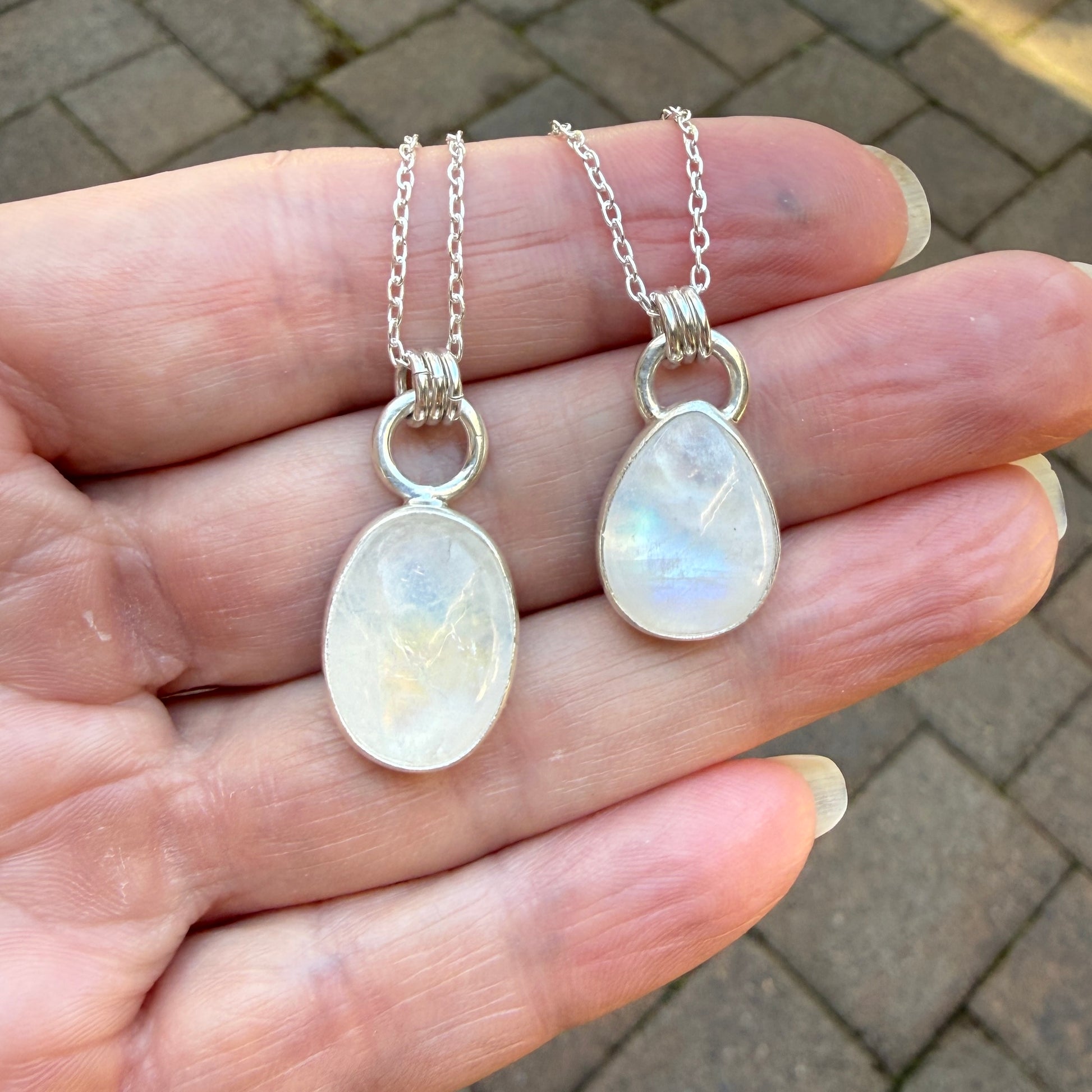 Handmade rainbow moonstone teardrop and oval sterling silver pendant necklaces — June birthstone jewelry by Accent Yourself, Corvallis Oregon