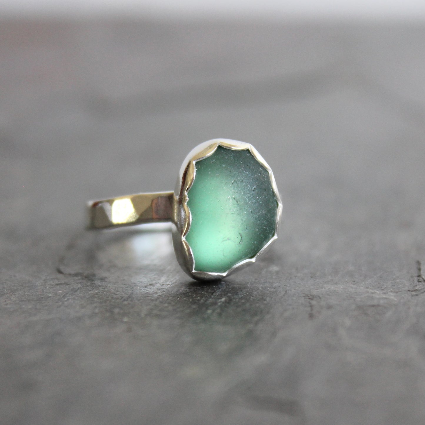 Accent Yourself celebrates the artistry of Barb and Will Macy, who handcraft sterling silver jewelry in Corvallis, Oregon. Their collection reflects a blend of elegance and nature, featuring luminous sea glass, vibrant gemstones, delicately woven chains, and timeless silver earrings.