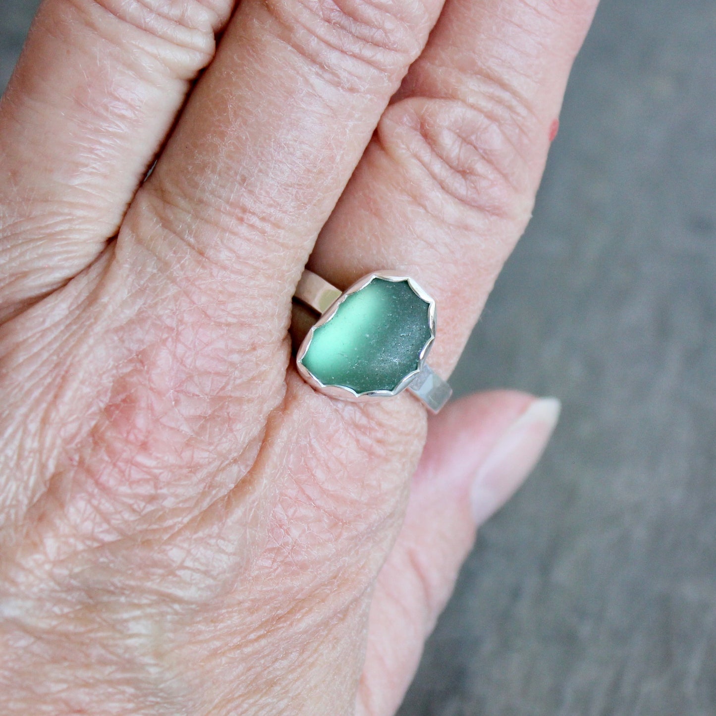 Accent Yourself celebrates the artistry of Barb and Will Macy, who handcraft sterling silver jewelry in Corvallis, Oregon. Their collection reflects a blend of elegance and nature, featuring luminous sea glass, vibrant gemstones, delicately woven chains, and timeless silver earrings.