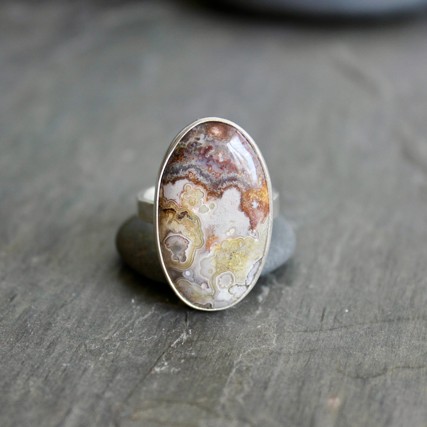 Accent Yourself celebrates the artistry of Barb and Will Macy, who handcraft sterling silver jewelry in Corvallis, Oregon. Their collection reflects a blend of elegance and nature, featuring luminous sea glass, vibrant gemstones, delicately woven chains, and timeless silver earrings.