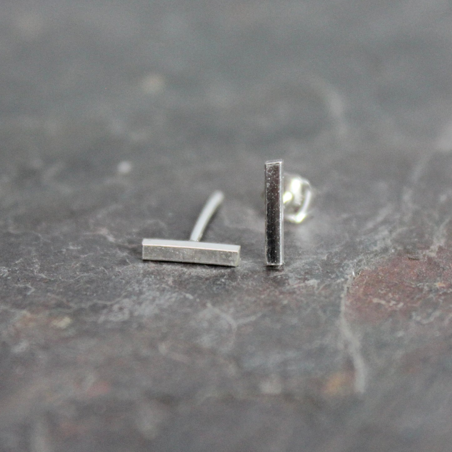 sterling silver bar studs that are approximately 8mm in length. 