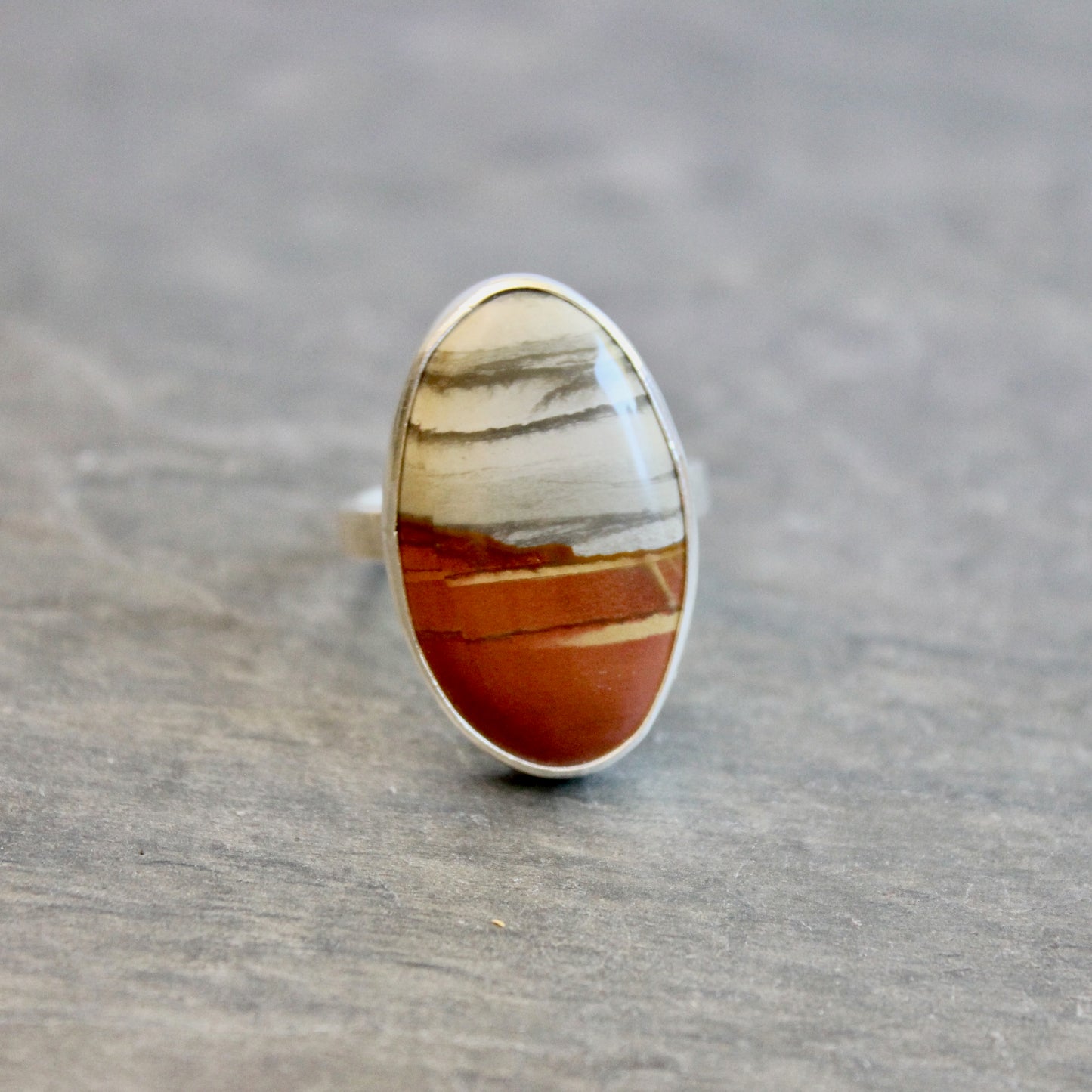Oregon Landscape Jasper statement ring in sterling silver, size 9¾ — orange and gray patterned oval cabochon in hammered silver bezel, handmade by Will Macy"
