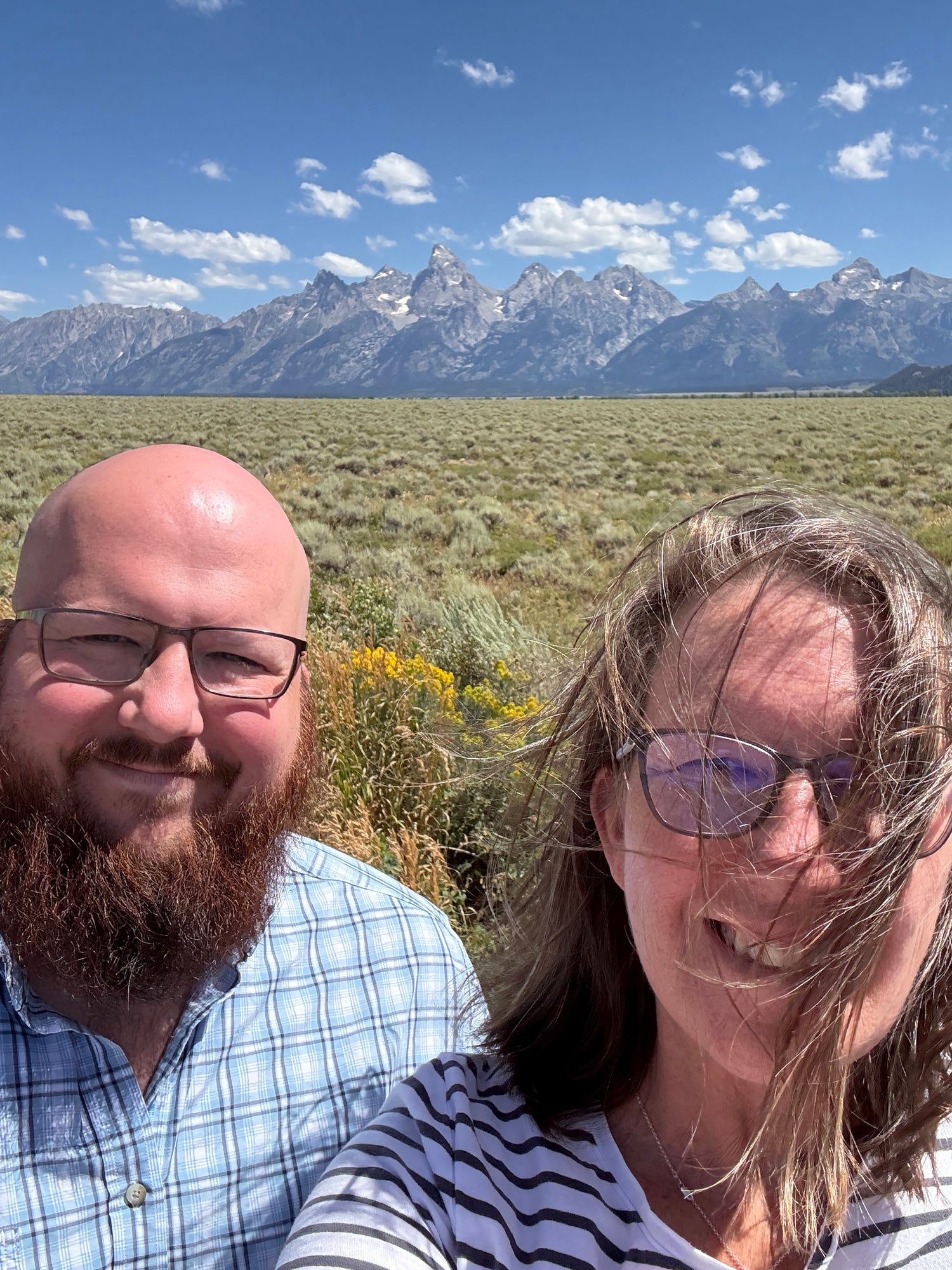 Barb and Will Macy with Grand Teton in the background.