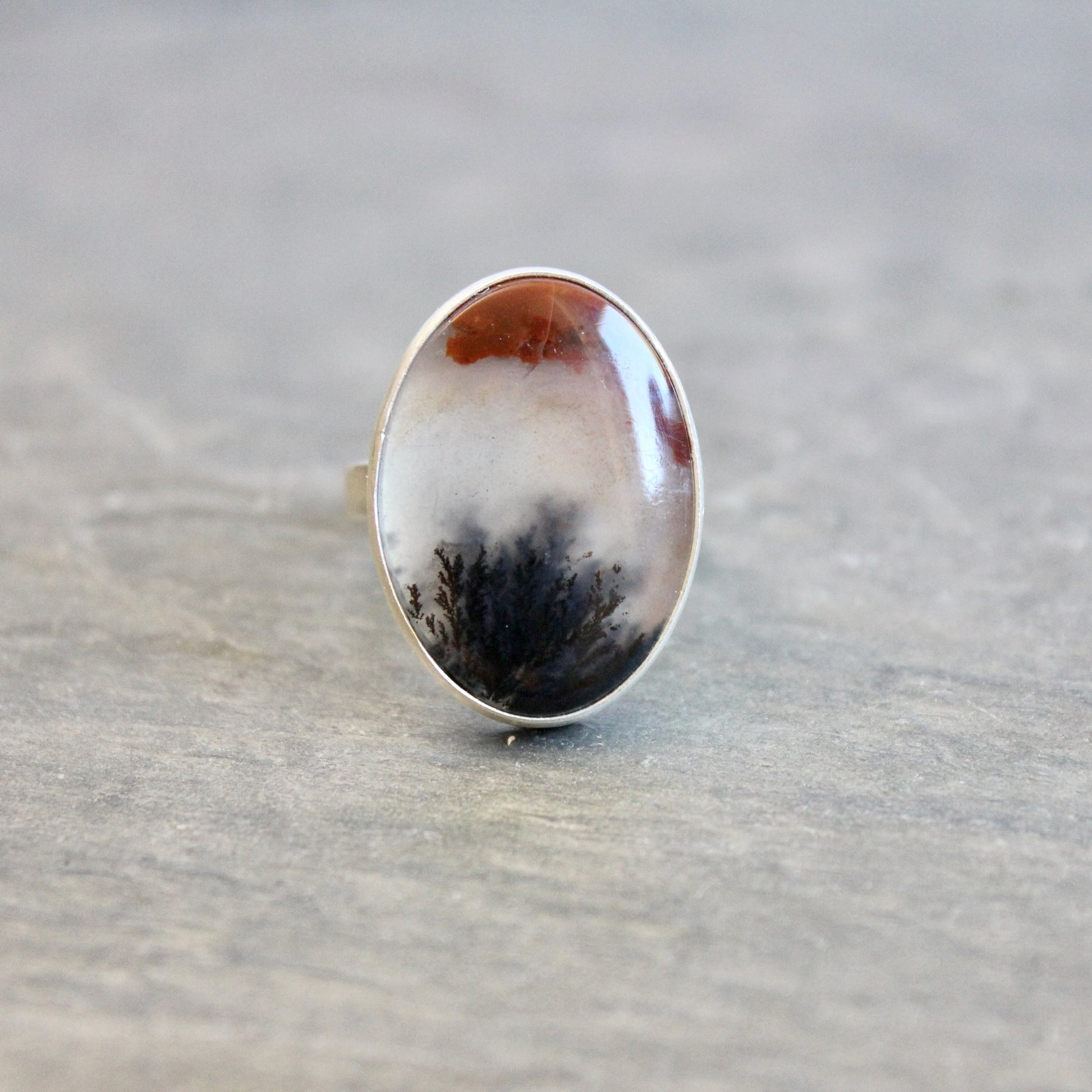 Crooked River Oregon Agate statement ring in sterling silver, size 7¾ — dendritic agate cabochon with black fern-like inclusions in hammered silver bezel, handmade by Will Macy