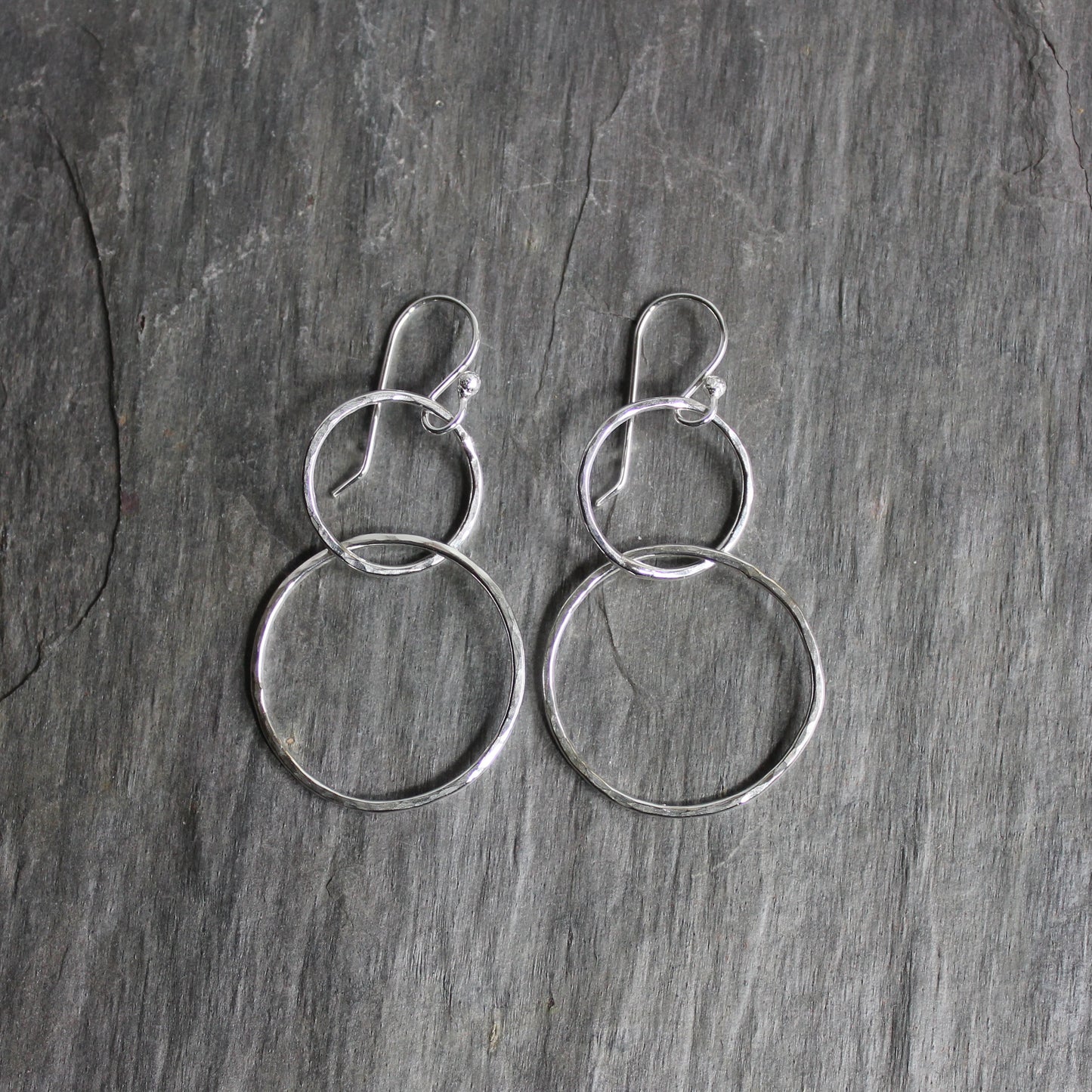 hammered silver double circle dangly earrings