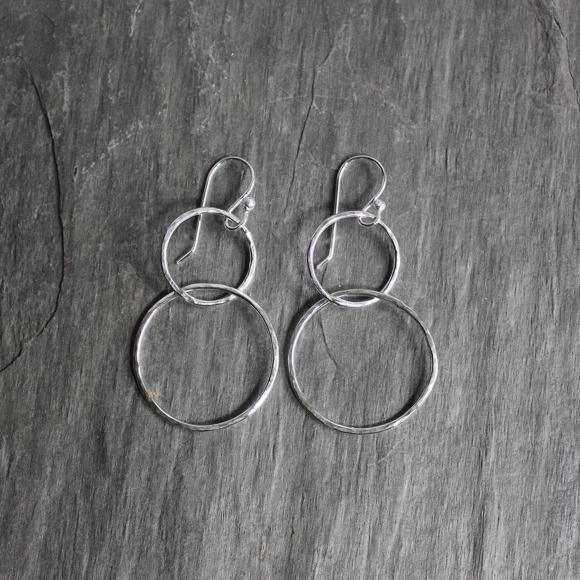hammered silver double circle dangly earrings