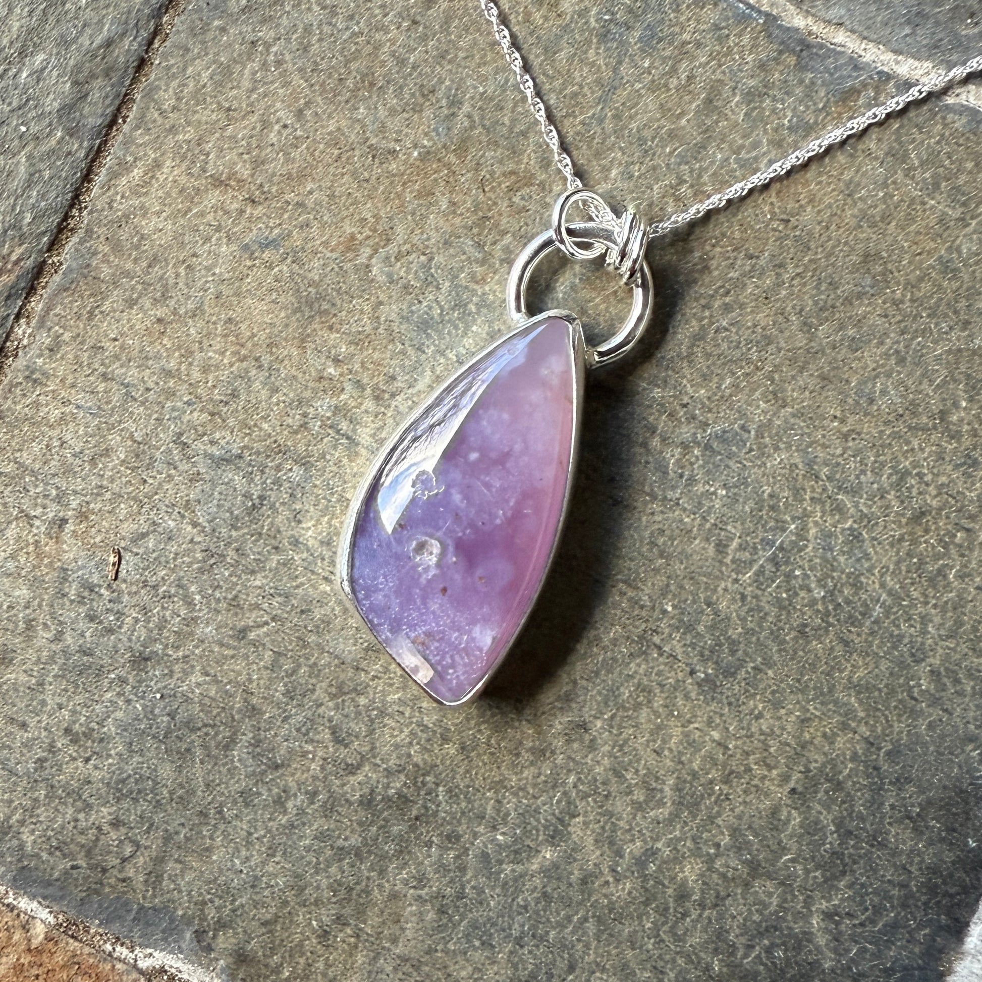 This pendant has a large Oregon Holley Blue agate cabochon that is set in a fine and sterling silver bezel setting and comes with a sterling silver chain.  Handmade by Will Macy in Corvallis, OR.