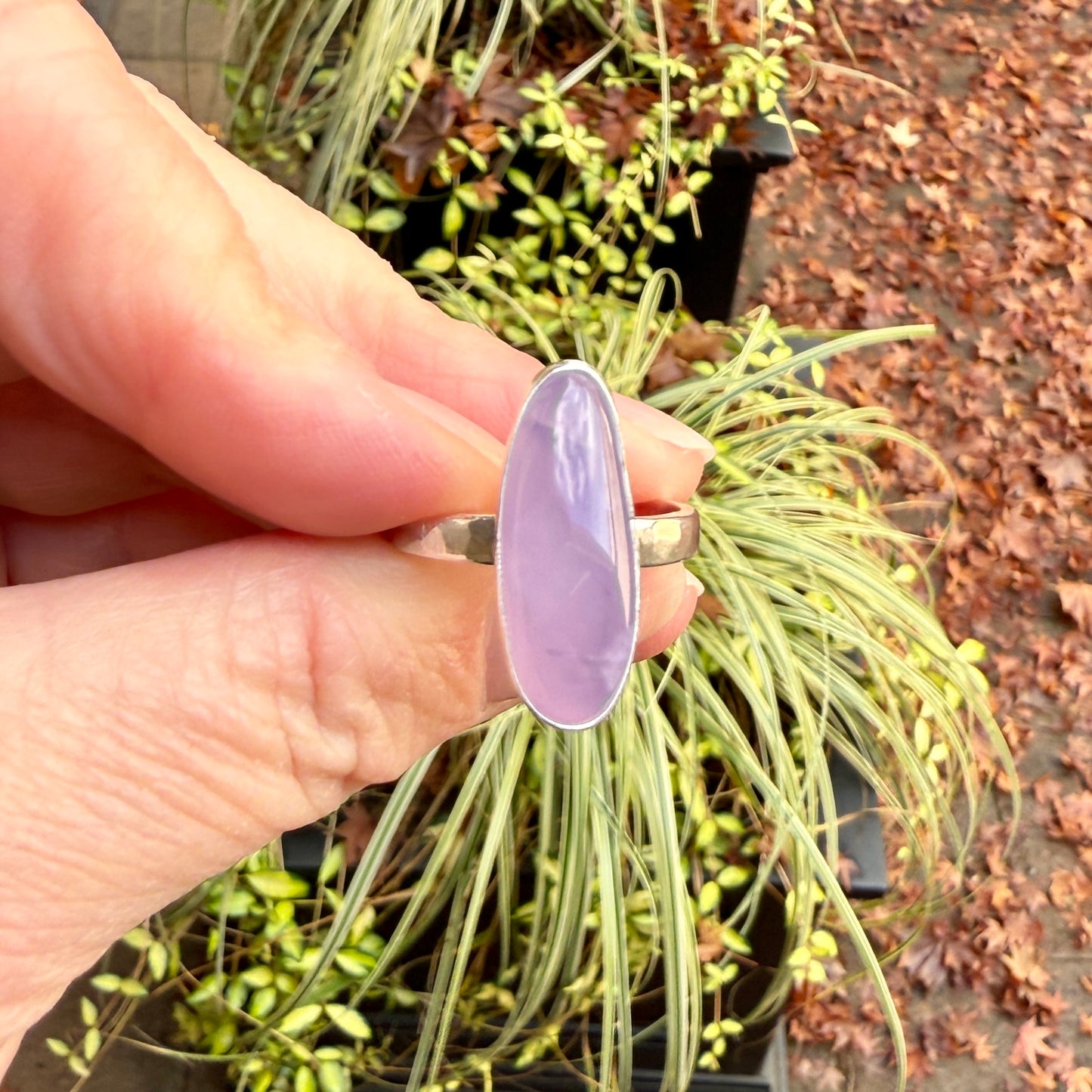 hand holding a sterling silver holley blue agate statement ring
