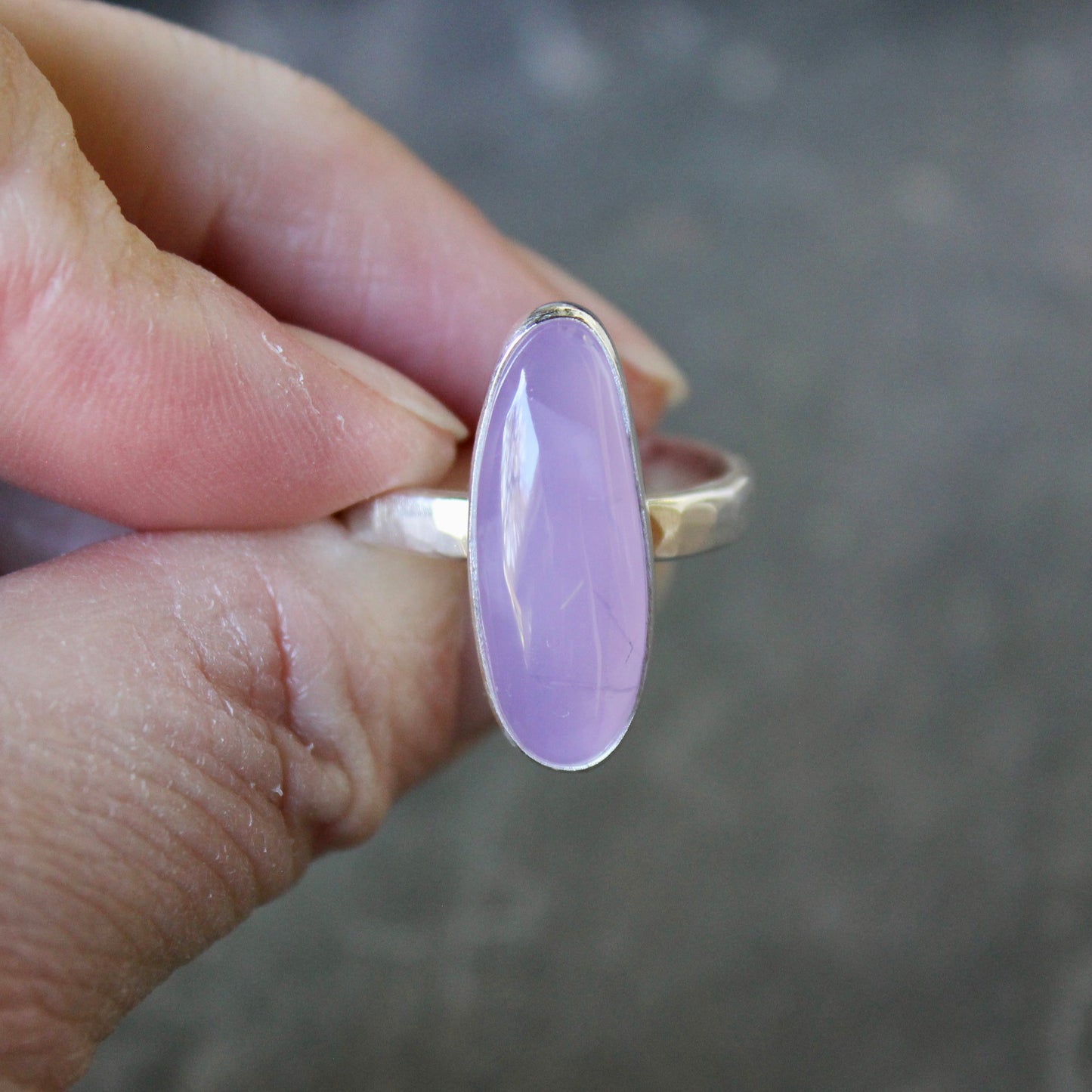 hand holding sterling silver holley blue agate statement ring