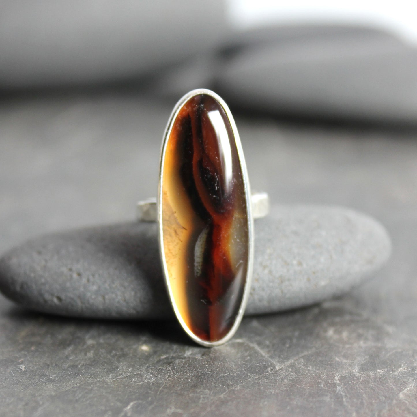 large oval montana agate bezel set ring set in sterling silver