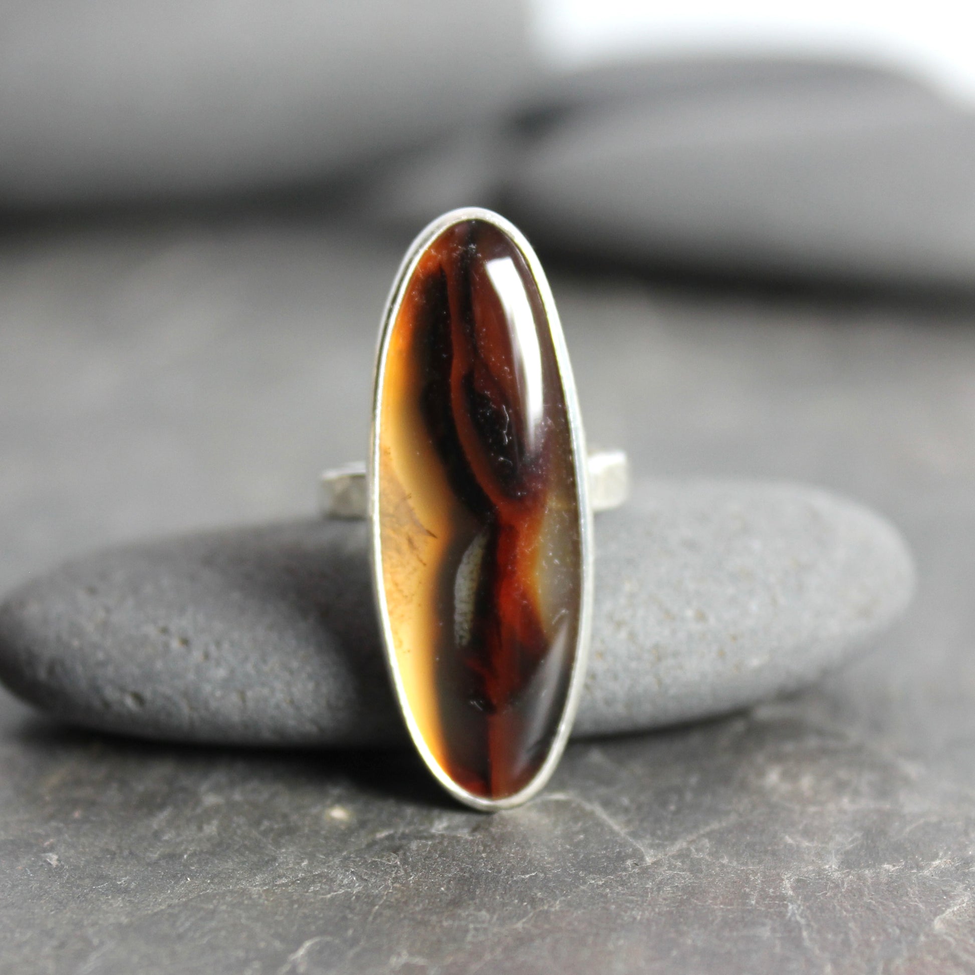large oval montana agate bezel set ring set in sterling silver
