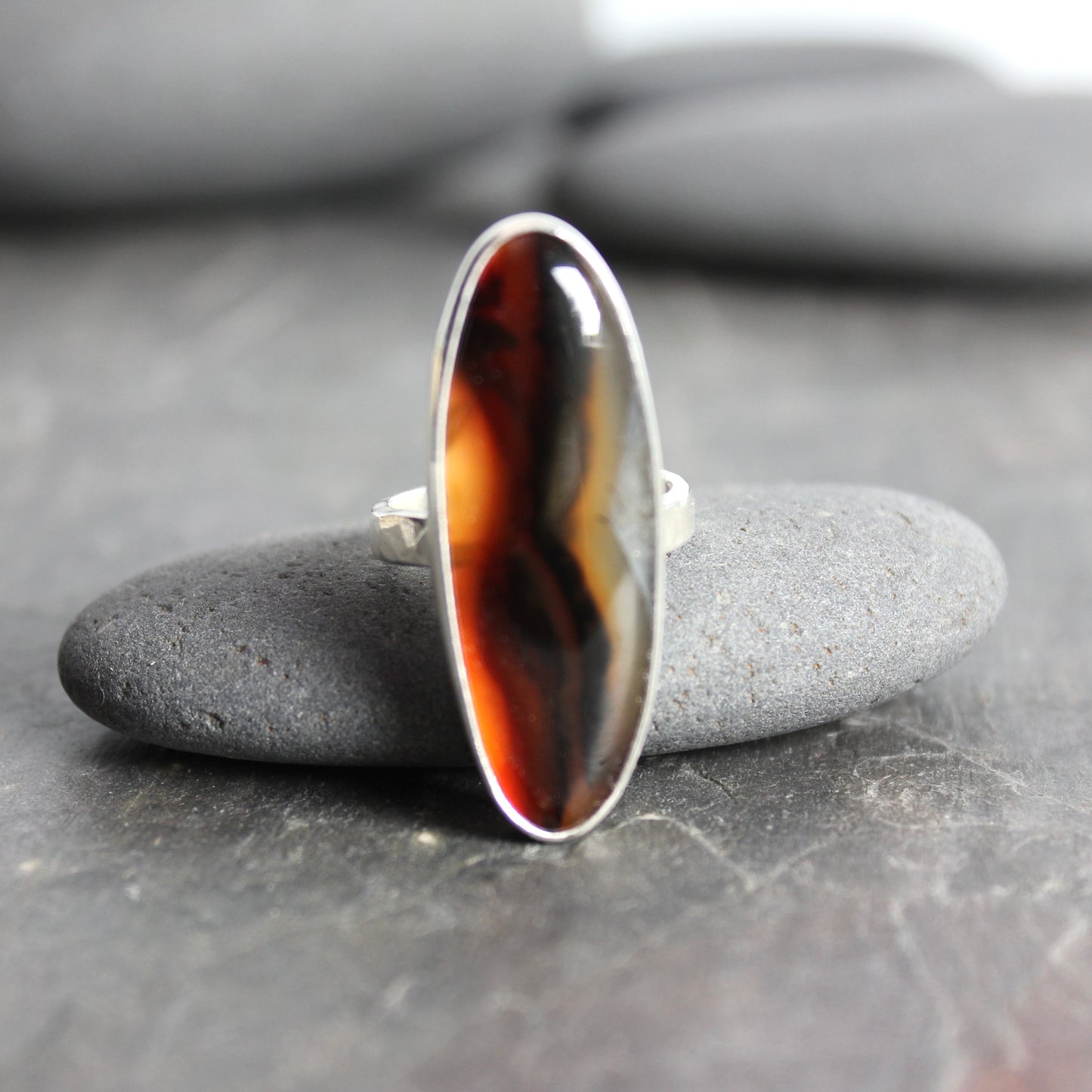 large oval montana agate bezel set ring set in sterling silver
