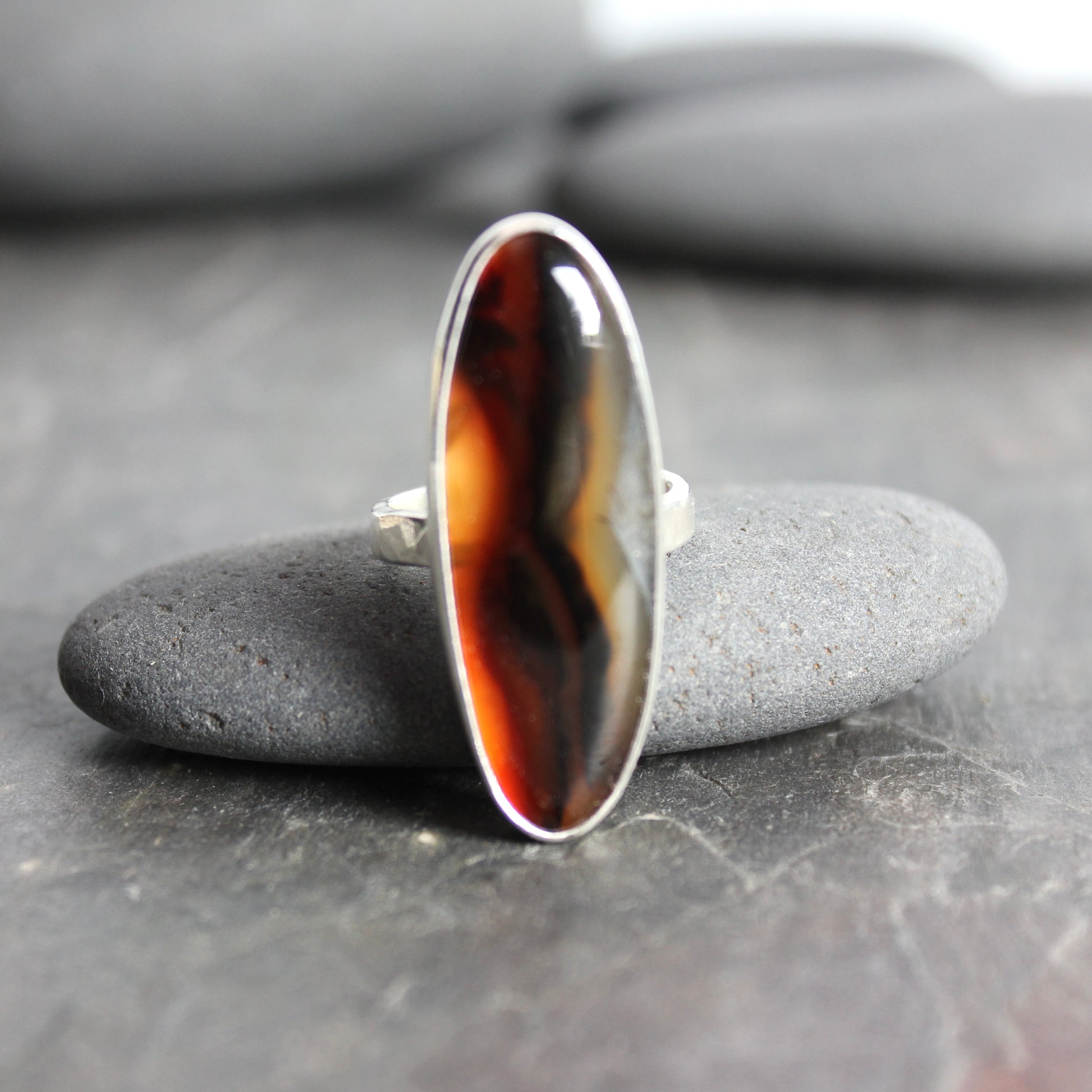 large oval montana agate bezel set ring set in sterling silver