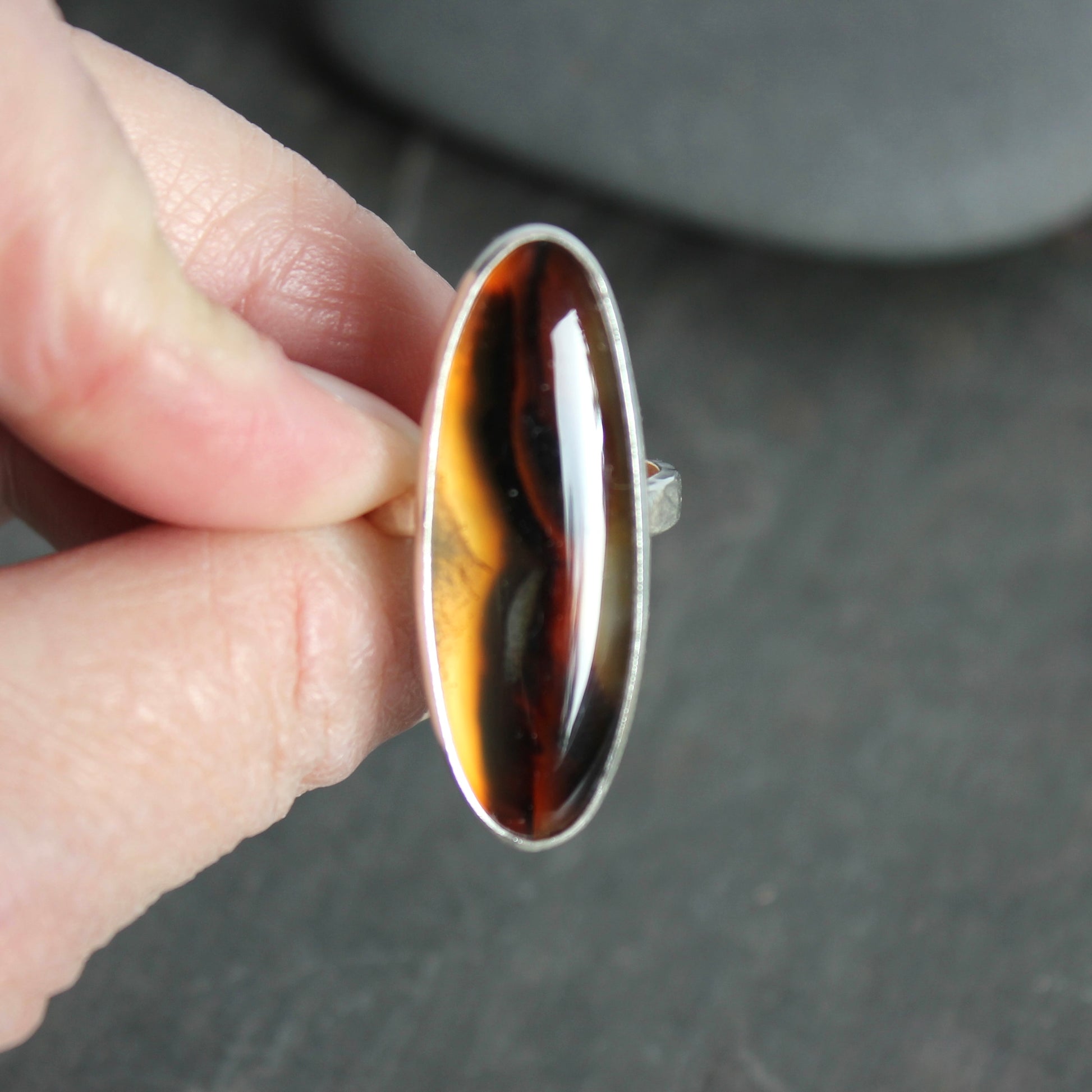 large oval montana agate bezel set ring set in sterling silver