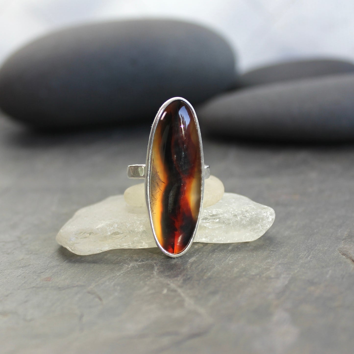 large oval montana agate bezel set ring set in sterling silver