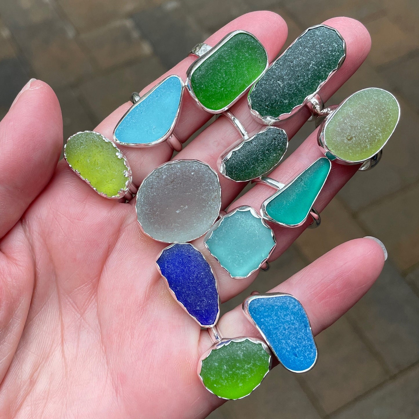 This ring has an ultra rare piece of vivid dark turquoise blue sea glass from Martinique in the Caribbean.  It is set in a plain fine & sterling silver bezel on a sturdy silver band.  Size 4 3/4
