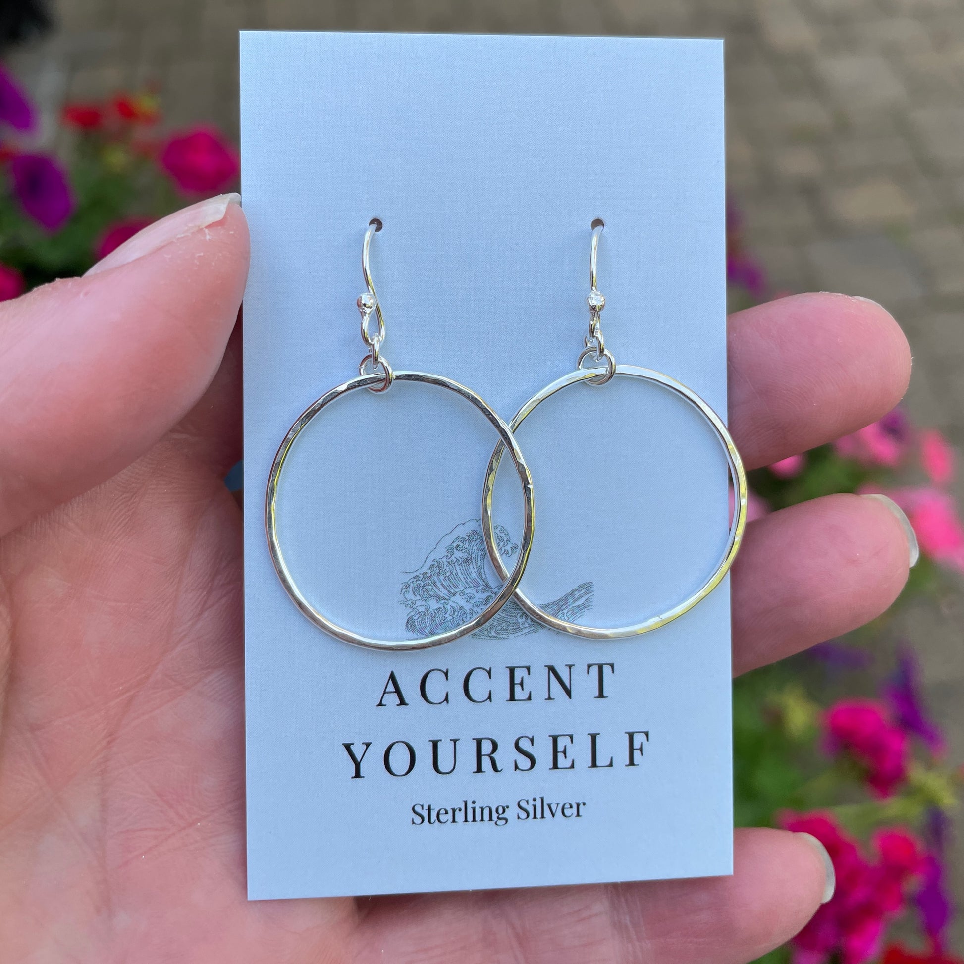 1 inch hammered circle earrings sterling silver on a jewelry card